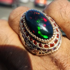 Absolutely stunning natural black opal in handmade sterling silver ring
